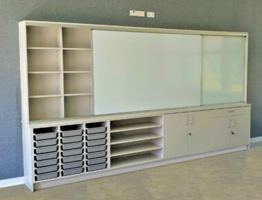 sliding whiteboard cabinet in classroom